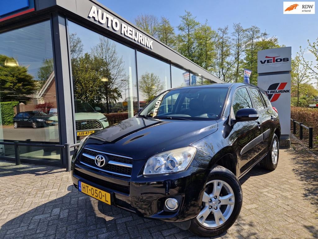 Toyota RAV4 2.0 VVTi Executive AUTOMAAT/4WD/TREKHAAK/LEDER/N, Auto's, Gebruikt, Zwart, 4 cilinders, Stoelverwarming