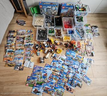 Enorme partij lego: 20kg, 100 sets incl boekjes, 100 figures beschikbaar voor biedingen