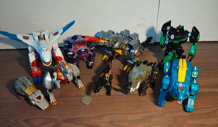 8 Transformers dino's, Verzamelen, Transformers, Ophalen of Verzenden