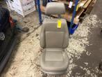 Stoel links van een Volkswagen Caddy
