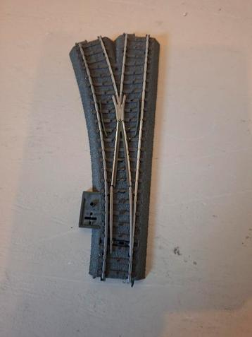 Märklin C-rail wissel links met decoder beschikbaar voor biedingen