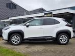 Toyota Yaris Cross 1.5 Hybrid 115 First Edition | AUTOMAAT, Stof, Gebruikt, Wit, 1490 cc