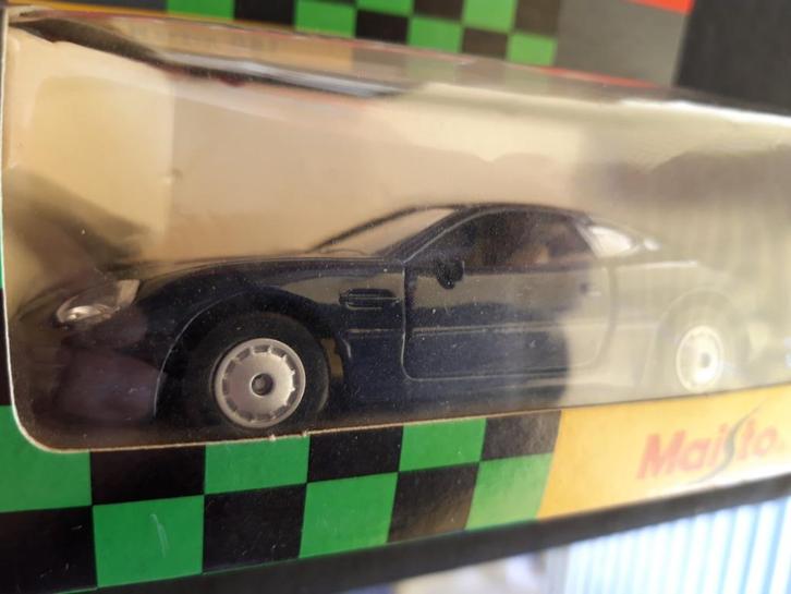 Aston Martin DB 7 donkerblauw 1/40, Hobby en Vrije tijd, Modelauto's | Overige schalen, Nieuw, Auto, Ophalen of Verzenden