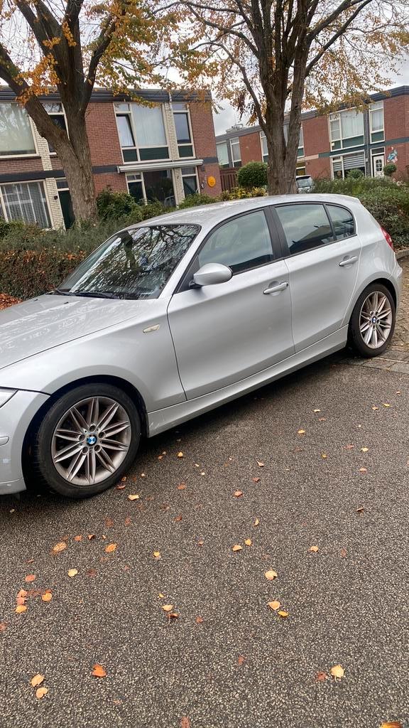 BMW 1-Serie 116, 5DR 2009 Grijs, Auto's, BMW, Particulier, 1-Serie, ABS, Adaptieve lichten, Adaptive Cruise Control, Airbags, Airconditioning
