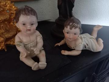 Twee biscuit porseleinen piano baby's beschikbaar voor biedingen