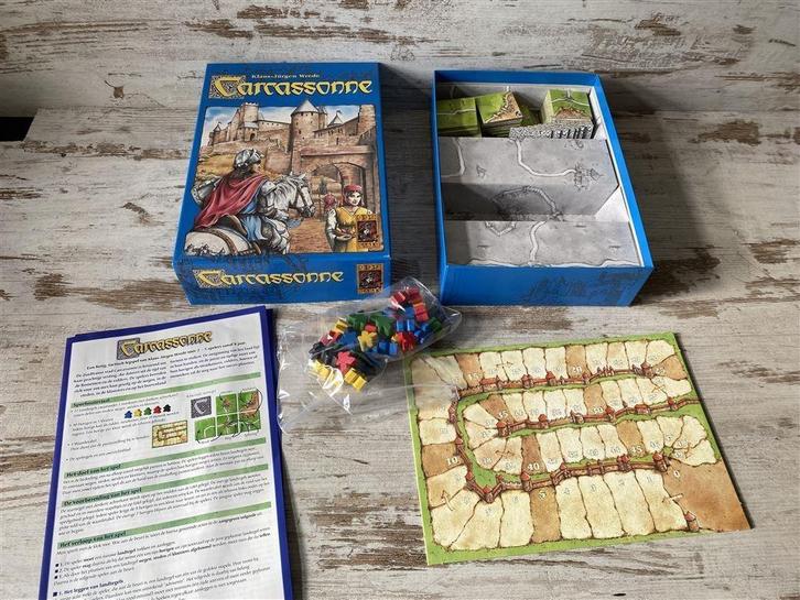 Carcassonne basisspel blauwe doos 999 games [s242], Hobby en Vrije tijd, Gezelschapsspellen | Bordspellen, Zo goed als nieuw, Ophalen of Verzenden