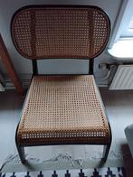 Rotan fauteuil van loods 5, Ophalen