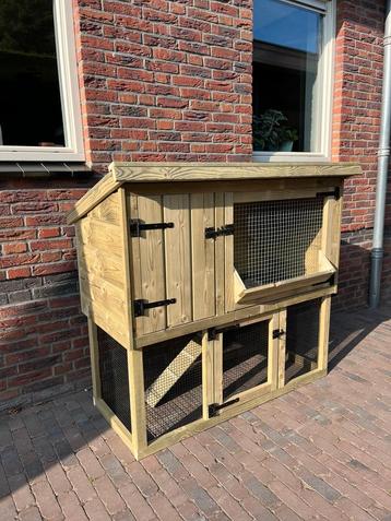 Degelijke en mooie konijnenhokken beschikbaar voor biedingen