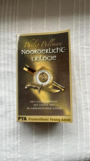 Philip Pullman - Noorderlichttrilogie paperback beschikbaar voor biedingen