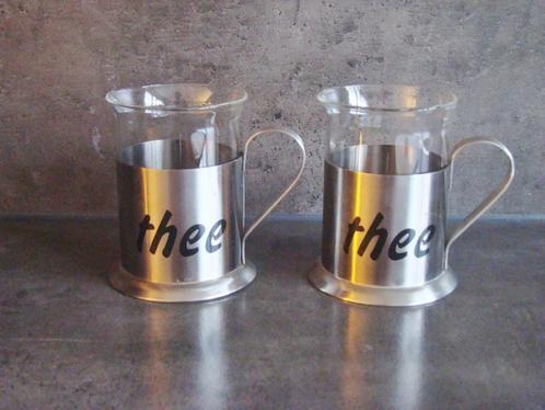 2 theeglazen in rvs houder, Huis en Inrichting, Keuken | Servies, Zo goed als nieuw, Glas of Glazen, Overige stijlen, Glas, Ophalen of Verzenden
