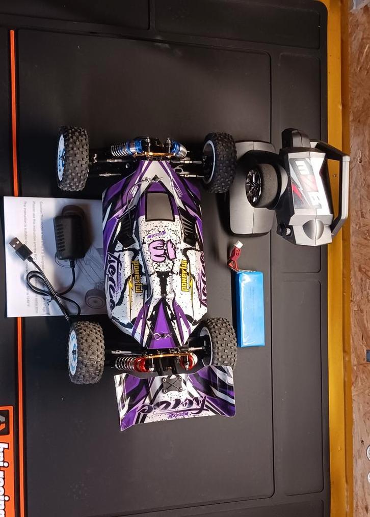 WL Toys 124017 met 4 nieuwe schokbrekers (WLToys), Hobby en Vrije tijd, Modelbouw | Radiografisch | Auto's, Zo goed als nieuw