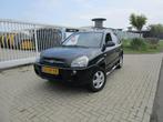 Hyundai Tucson 2.0i Active, Leer, Sidebars, Lederen bekleding, 4 cilinders, Zwart, Leder