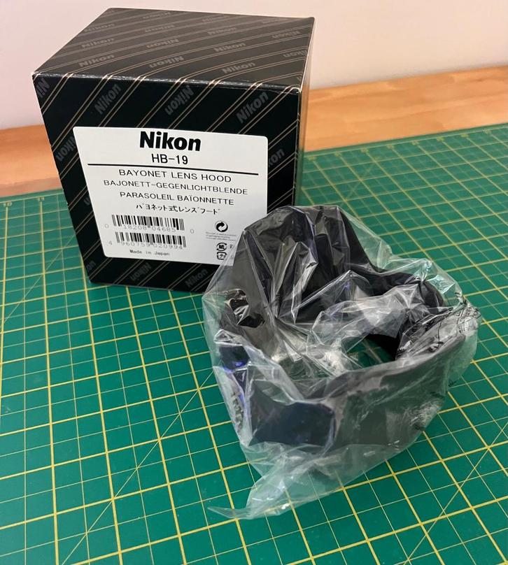 Nikon HB-19 lens hood, Audio, Tv en Foto, Fotografie | Lenzen en Objectieven, Nieuw, Toebehoren, Ophalen of Verzenden