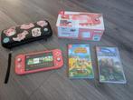 Nintendo Switch Lite coral met spellen, Spelcomputers en Games, Spelcomputers | Nintendo Switch Lite, Ophalen of Verzenden, Zo goed als nieuw