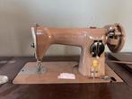 Degelijke singer naaimachine voor onderdelen, Ophalen