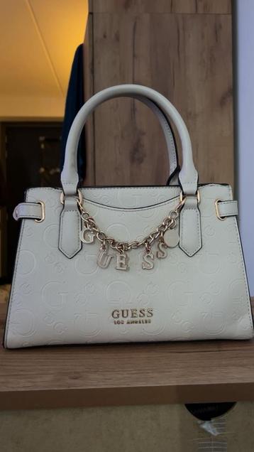 Guess hand/schouder tas.  beschikbaar voor biedingen