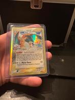 Charizard delta species stamped, Ophalen of Verzenden, Zo goed als nieuw, Meerdere kaarten, Foil