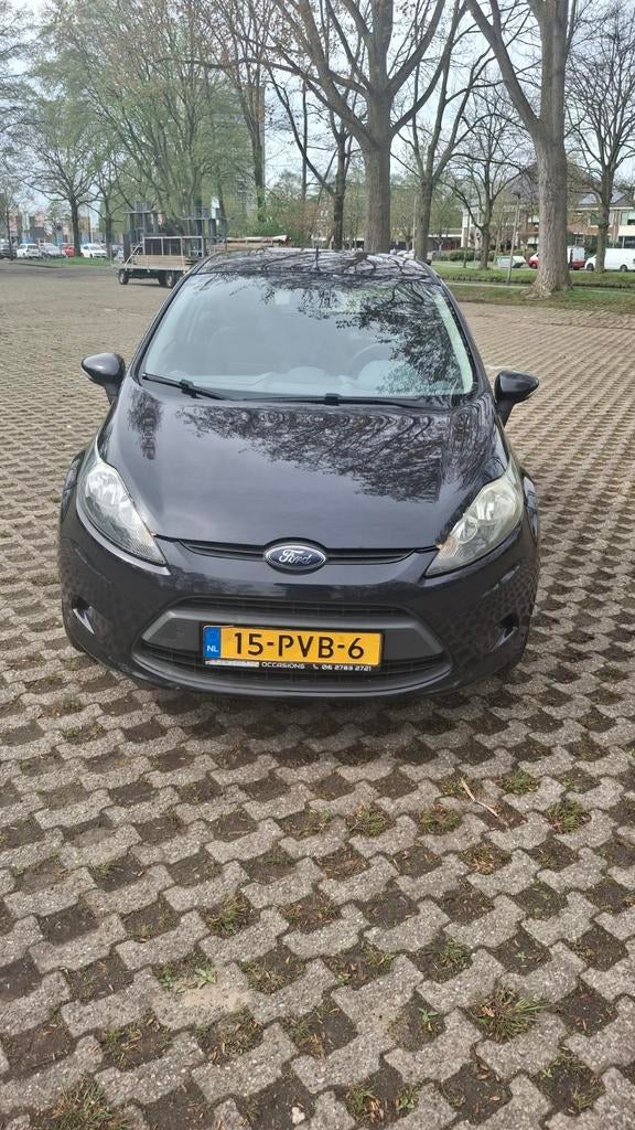 Ford Fiësta 1.25 44KW 5DR 2011 Zwart, Airco, Auto's, Voorwielaandrijving, Stof, 40 €/maand, 1242 cc
