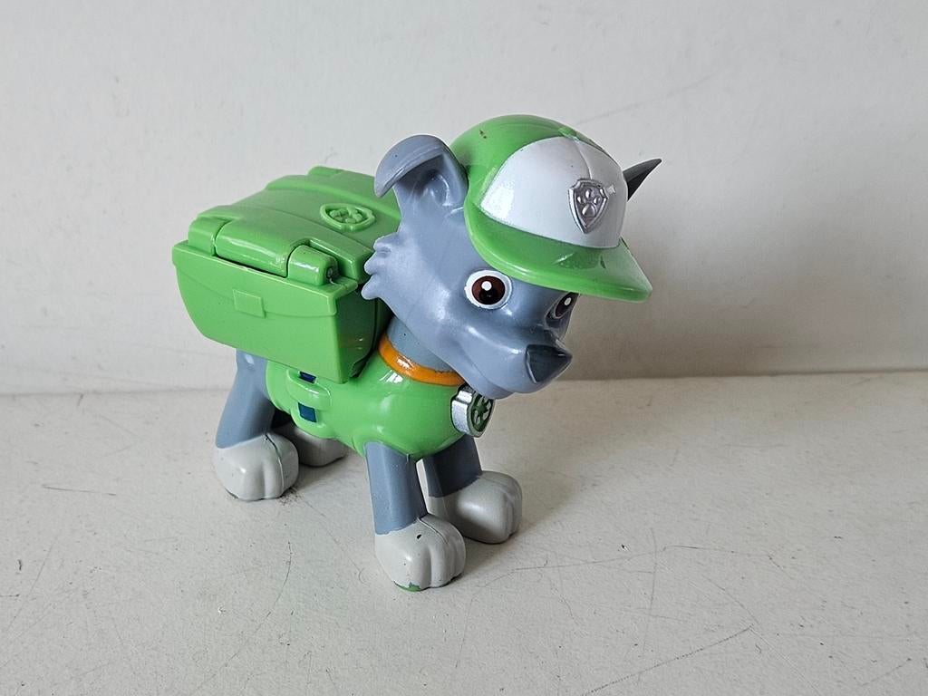 Paw Patrol Action Pup Rocky (6 cm) - Lichte slijtage, Kinderen en Baby's, Speelgoed | Actiefiguren, Ophalen of Verzenden, Gebruikt