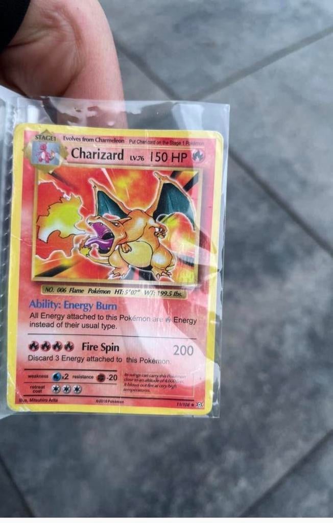 Pokémon Charizard Kaart - Base Set Reprint 2016, Ophalen of Verzenden, Gebruikt, Losse kaart