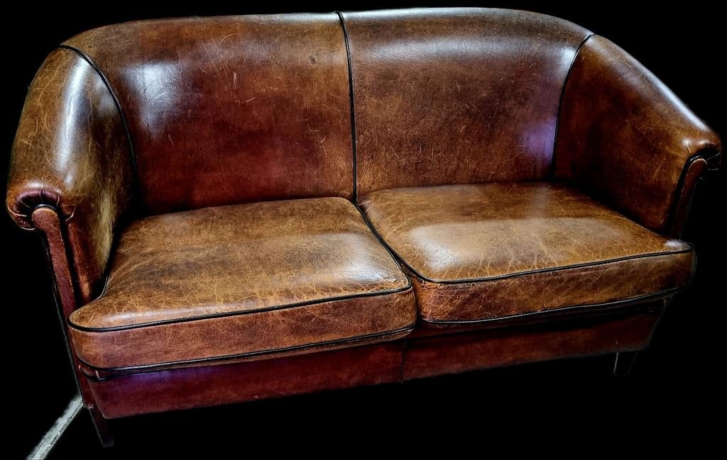 Oude Schapenleren vintage bank + BEZORGING GRATIS