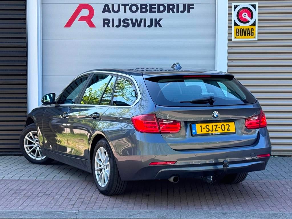 BMW 3-serie Touring 316i Executive Upgrade Navi/Trekhaak, Auto's, BMW, Gebruikt, Euro 6, 4 cilinders, Navigatiesysteem