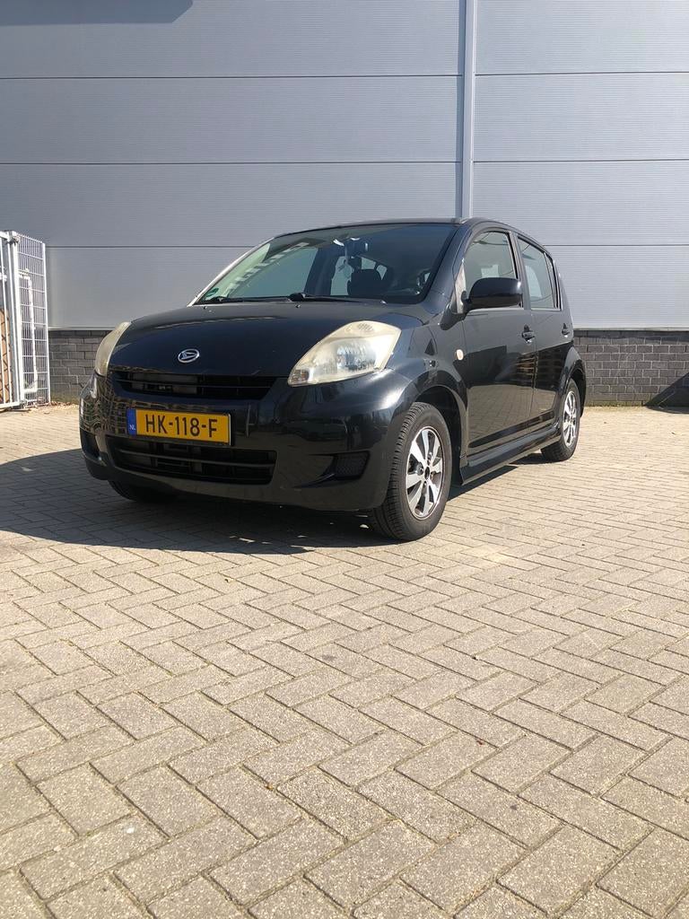 Daihatsu sirion 1.0 51kw 2008 Airco met APK, Voorwielaandrijving, 74 pk, 918 kg, Zwart