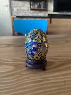 beschilderd ei op foetje, Ophalen