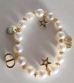 Dior bedel armband, Sieraden, Tassen en Uiterlijk, Armbanden, Met bedels of kralen, Kunststof of Plastic, Nieuw, Ophalen of Verzenden