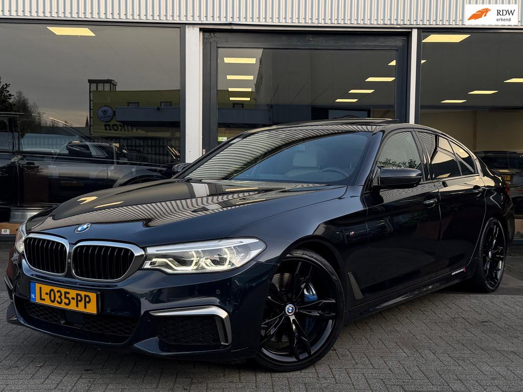 BMW 5-serie M550i xDrive High Executive 4.4 V8 462PK/MASSAGE, Auto's, BMW, Automaat, Gebruikt, 2000 kg, 4395 cc