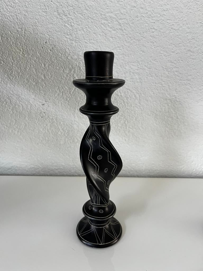 Keniaanse speksteen kandelaar Kisii, Ophalen