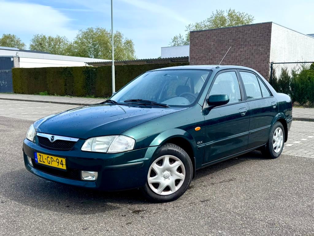 Nette Mazda 323 1.5 SDN LX 1999 Groen, Auto's, Mazda, Particulier, Benzine, Sedan, Handgeschakeld, Origineel Nederlands, Groen