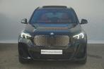 BMW iX1 eDrive20 M Sportpakket Pro 19'' / Panoramadak / Harm, Stof, 750 kg, Met garantie (alle), Zwart