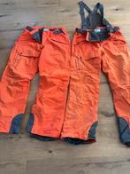 2x Salomon  Ski broek maat 52 Oranje, Ophalen of Verzenden, Zo goed als nieuw, Maat 52/54 (L), Broek