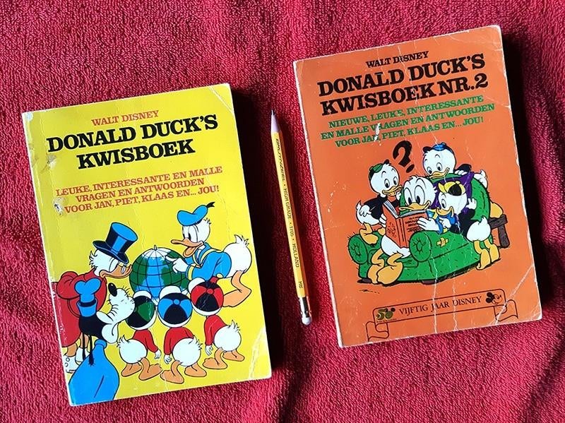 Donald Duck’s Kwisboek deel 1 en deel 2.  1e druk., Meerdere stripboeken, Verzenden, Gelezen