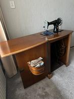 Antieke naaimachine, Ophalen