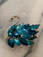 Zwanen broche met blauwe steentjes, Sieraden, Tassen en Uiterlijk, Broches, Ophalen of Verzenden, Zo goed als nieuw, Blauw, Overige materialen