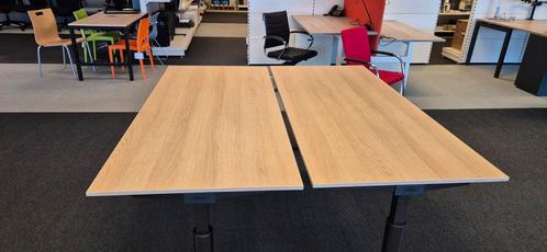 2 Gispen bureaus 180x80cm licht eiken in hoogte verstelbaar, Zakelijke goederen, Kantoor en Winkelinrichting | Kantoormeubilair en Inrichting