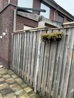 Kattenrol voor schutting, Ophalen