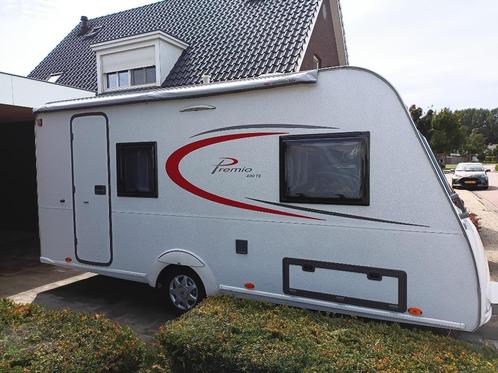 Caravan Burstner Premio 400 TS    bj. 2013, Caravans en Kamperen, Caravans, Particulier, tot en met 3, 750 - 1000 kg, Treinzit