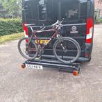 Stevige fietsendrager met verrijdbaar bovendek, Ophalen