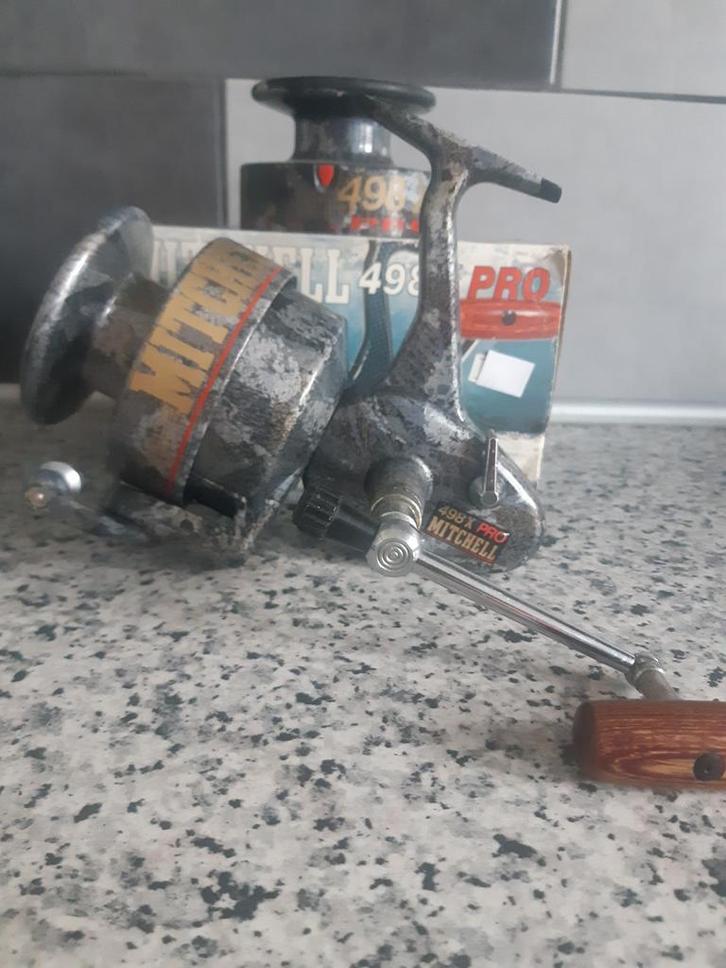 Mitchell 498 X Pro vismolen collectors item, Watersport en Boten, Hengelsport | Zeevissen, Molen, Ophalen of Verzenden