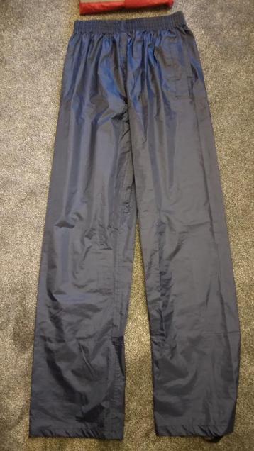 Blauwe regenbroek maat S/M * lengte 115 cm. NIEUW beschikbaar voor biedingen