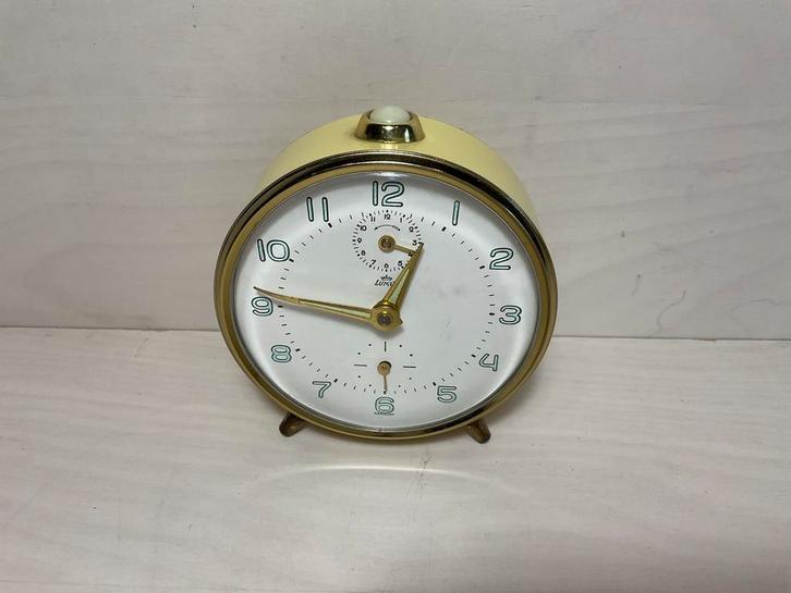 Vintage gele bureauklok met alarm van het merk Lumen, Huis en Inrichting, Woonaccessoires | Klokken, Gebruikt, Wekker of Tafelklok