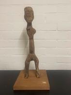 Afrikaanse houten pop beeld, Ophalen