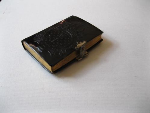 Klein antiek missaaltje in een zeldzame zwarte kleur 1905, Antiek en Kunst, Curiosa en Brocante, Ophalen of Verzenden