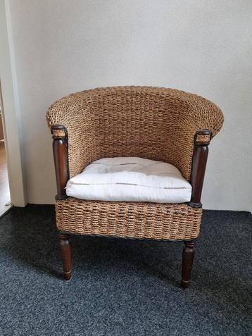 Rotan Stoel met Kussen beschikbaar voor biedingen