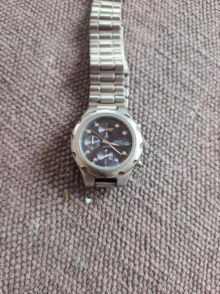 Guess horloge, titanium., Sieraden, Tassen en Uiterlijk, Sporthorloges, Gebruikt, iOS, Zilver, Waterdicht, Ophalen of Verzenden