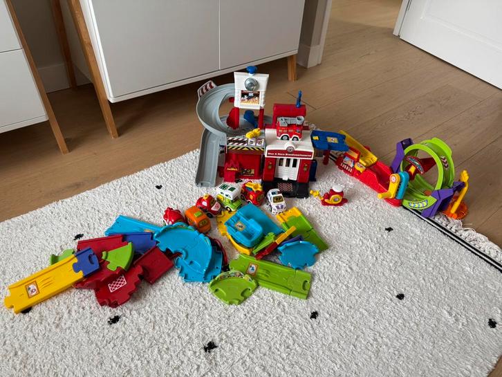 VTech Toet Toet Brandweerkazerne + Racebaan + Auto’s, Kinderen en Baby's, Speelgoed | Vtech, Zo goed als nieuw, 2 tot 4 jaar, Ophalen of Verzenden