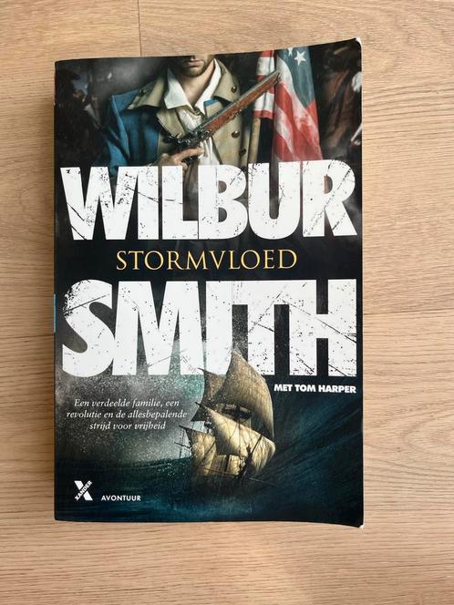 Stormvloed - Wilbur Smith, Boeken, Historische romans, Zo goed als nieuw, Ophalen of Verzenden